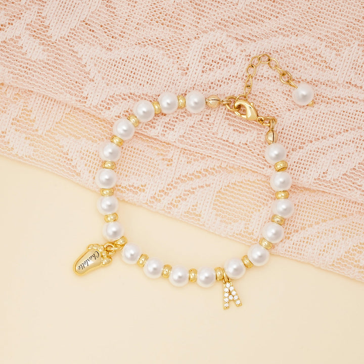 Baby Keepsake Pearl Bracelet with Name Foot and Initial Charm