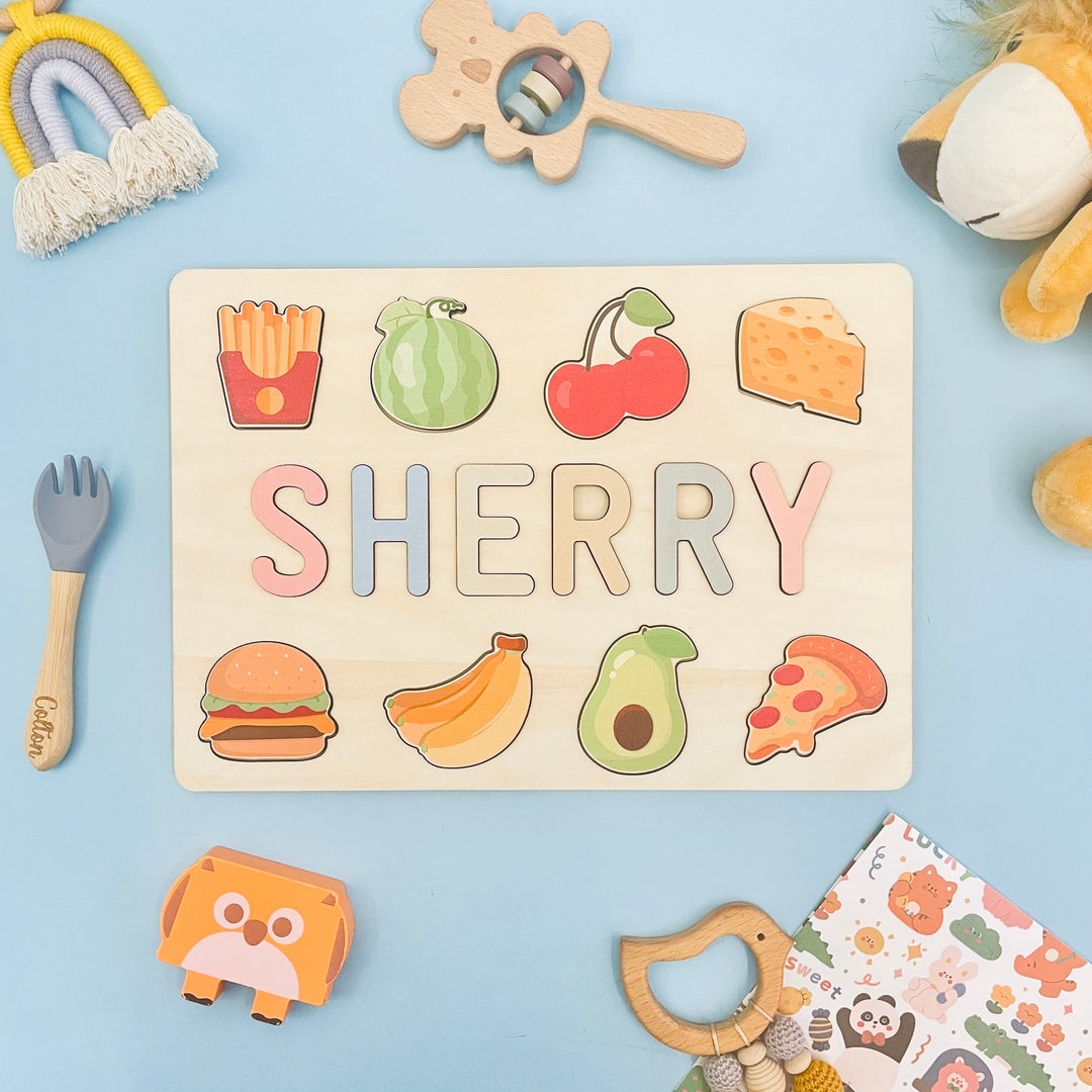 wooden baby name puzzle with food